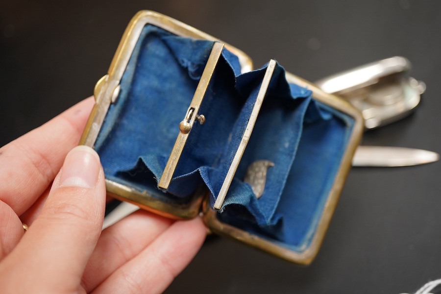 An Edwardian silver sovereign/half sovereign case, William Neale & Sons, Chester, 1906, 61mm, together with a mother of pearl handled silver fruit knife, a tortoiseshell purse and a shell mounted pen knife.